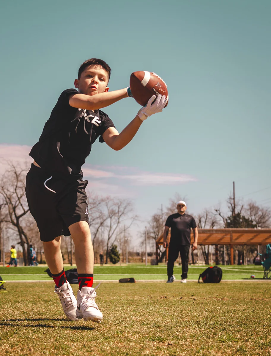 An athlete training on the field by Rose Rock Productions
